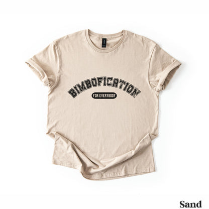 Sand t-shirt with &amp;quot;BIMBOFICATION FOR EVERYBODY&amp;quot; in arched black text.