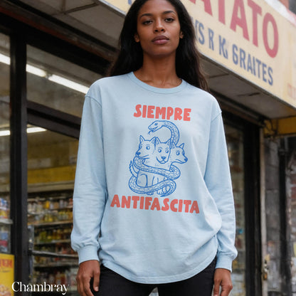 Light blue long-sleeve shirt with &amp;quot;SIEMPRE ANTIFASCISTA&amp;quot; and intertwined snake and dogs graphic.