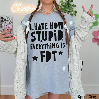 Light grey t-shirt with &amp;quot;I hate how stupid everything is FDT&amp;quot; graphic, worn by a person.
