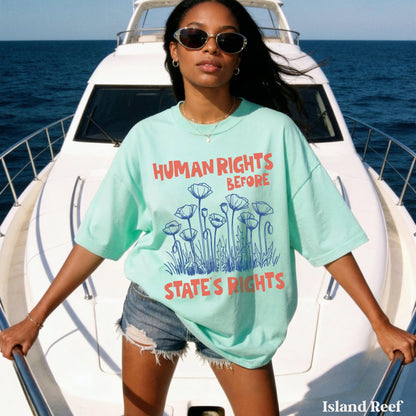 Woman in mint t-shirt with &amp;quot;HUMAN RIGHTS BEFORE STATE&amp;