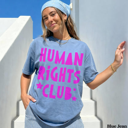 Blue t-shirt with &amp;quot;HUMAN RIGHTS CLUB&amp;quot; in pink text and stars, worn by a woman.