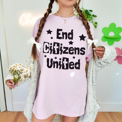 Pink t-shirt with &amp;quot;End Citizens United&amp;quot; and stars, worn by a person with braids.