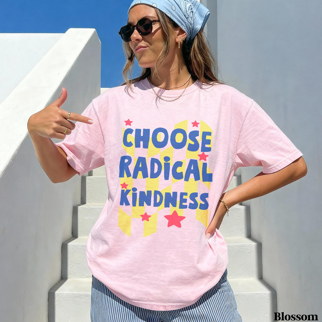 Woman wearing a pink t-shirt with &amp;quot;CHOOSE RADICAL KINDNESS&amp;quot; text.
