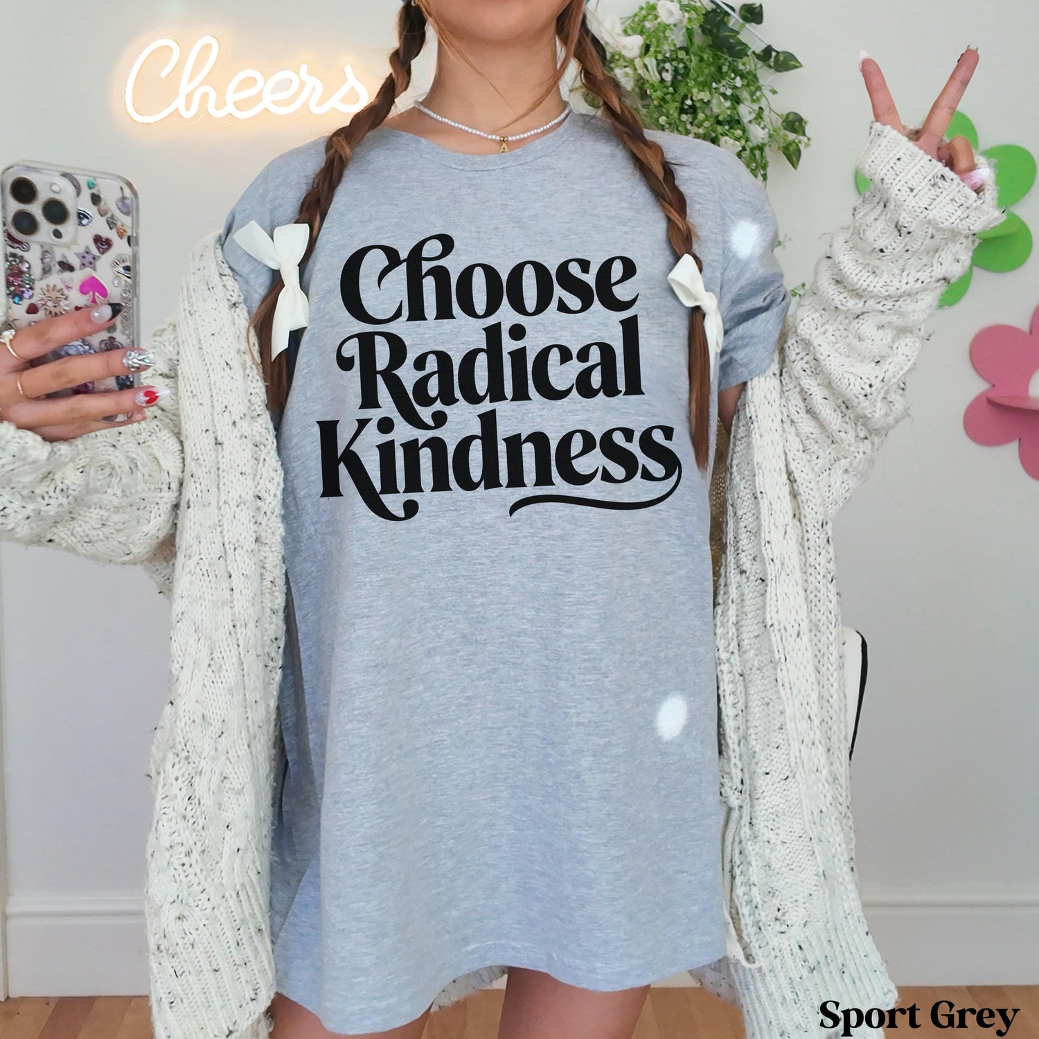 Light grey t-shirt with &amp;quot;Choose Radical Kindness&amp;quot; text and white bows in hair.