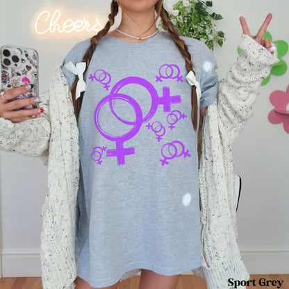 Light grey t-shirt with purple female symbols and smaller female symbols and bows.