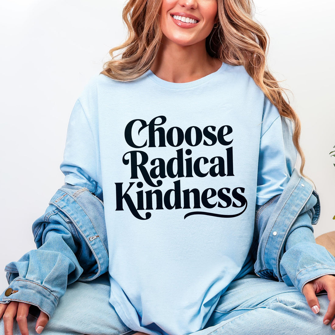 Light blue long sleeve shirt with &amp;quot;Choose Radical Kindness&amp;quot; text in black.