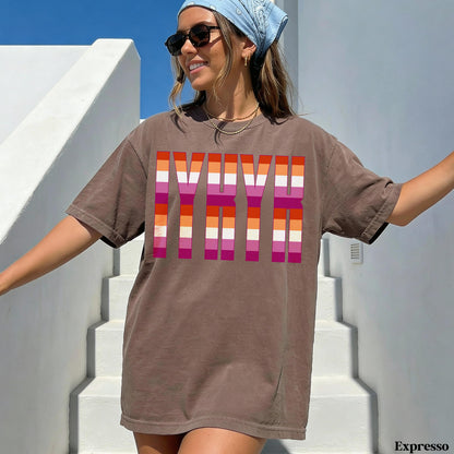 Brown t-shirt with colorful LGBTQ+ pride stripes forming the letters YNK.