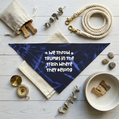 Dark blue tie-dye bandana with white text: &amp;quot;we throw TRUMPS in the Trash Where They Belong&amp;quot;.