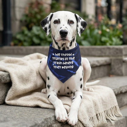 Dalmatian dog wearing a blue bandana with white text.