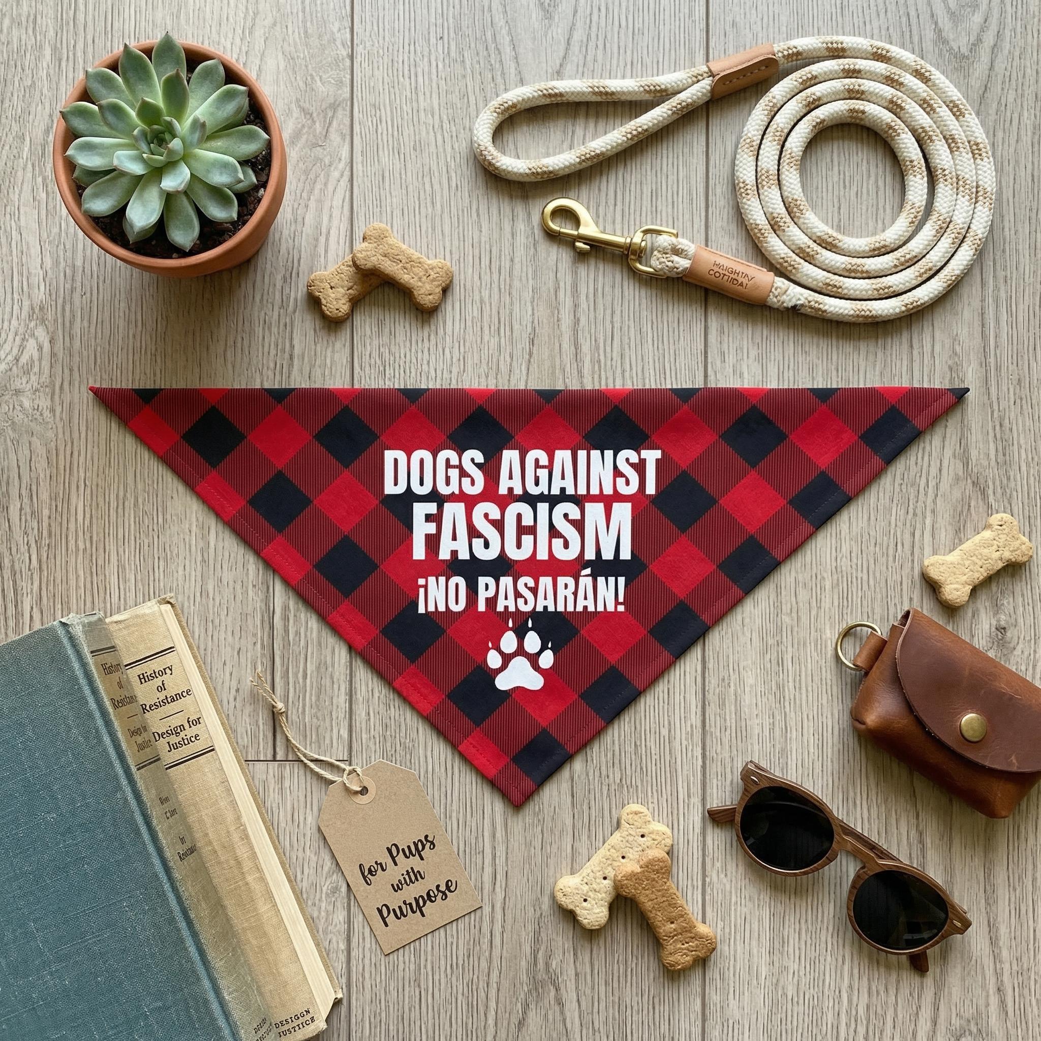Red and black buffalo plaid bandana with &amp;quot;Dogs Against Fascism ¡No Pasarán!&amp;quot; text.