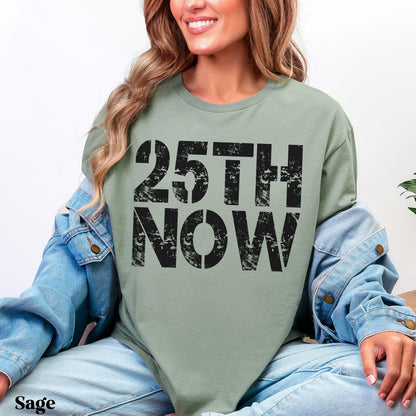 Sage green t-shirt with &amp;quot;25TH NOW&amp;quot; in bold black lettering.