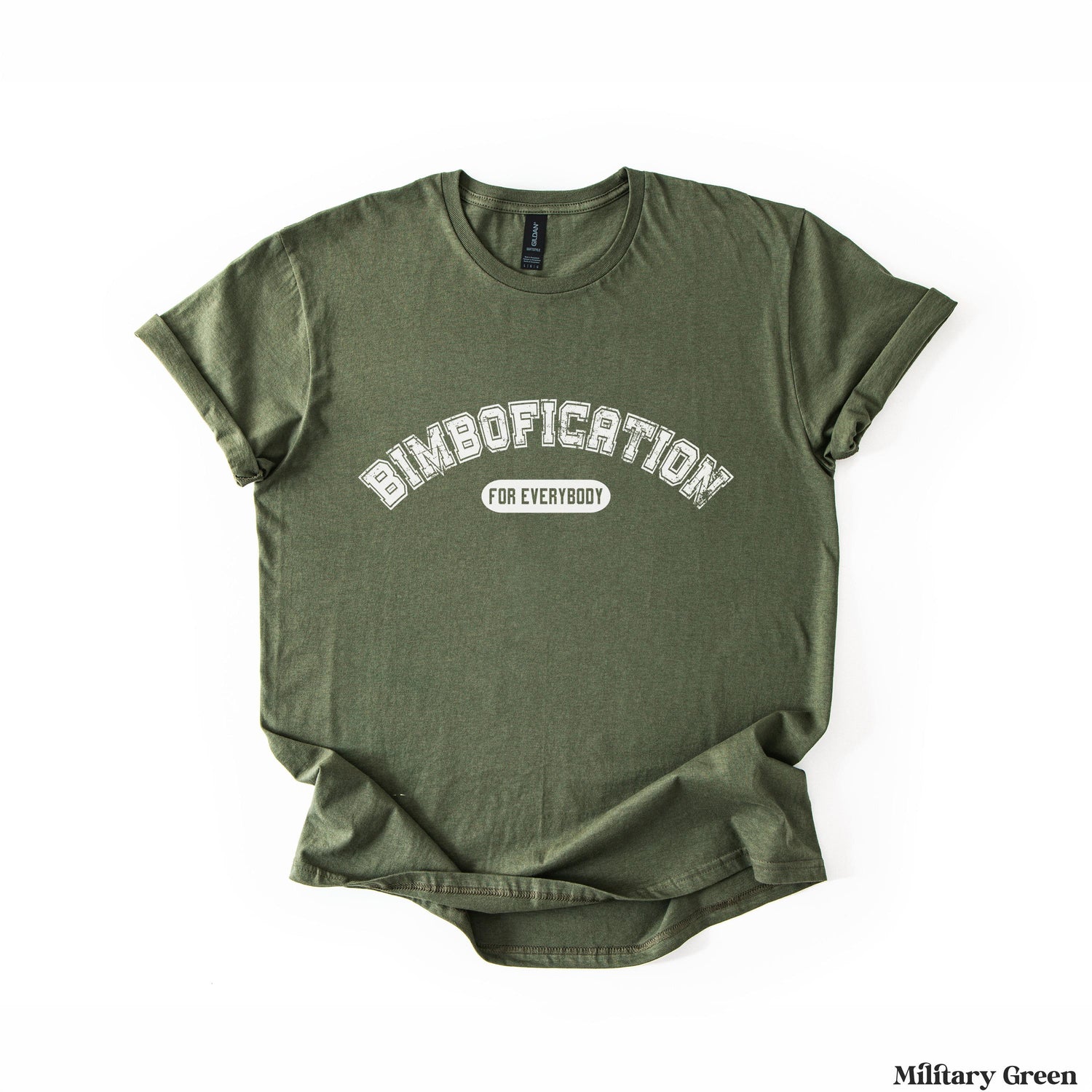 Green t-shirt with &amp;quot;BIMBOFICATION FOR EVERYBODY&amp;quot; text in a white arched font.