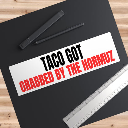 Red and white text sticker reading &amp;quot;TACO GOT GRABBED BY THE HORMUZ&amp;quot;.