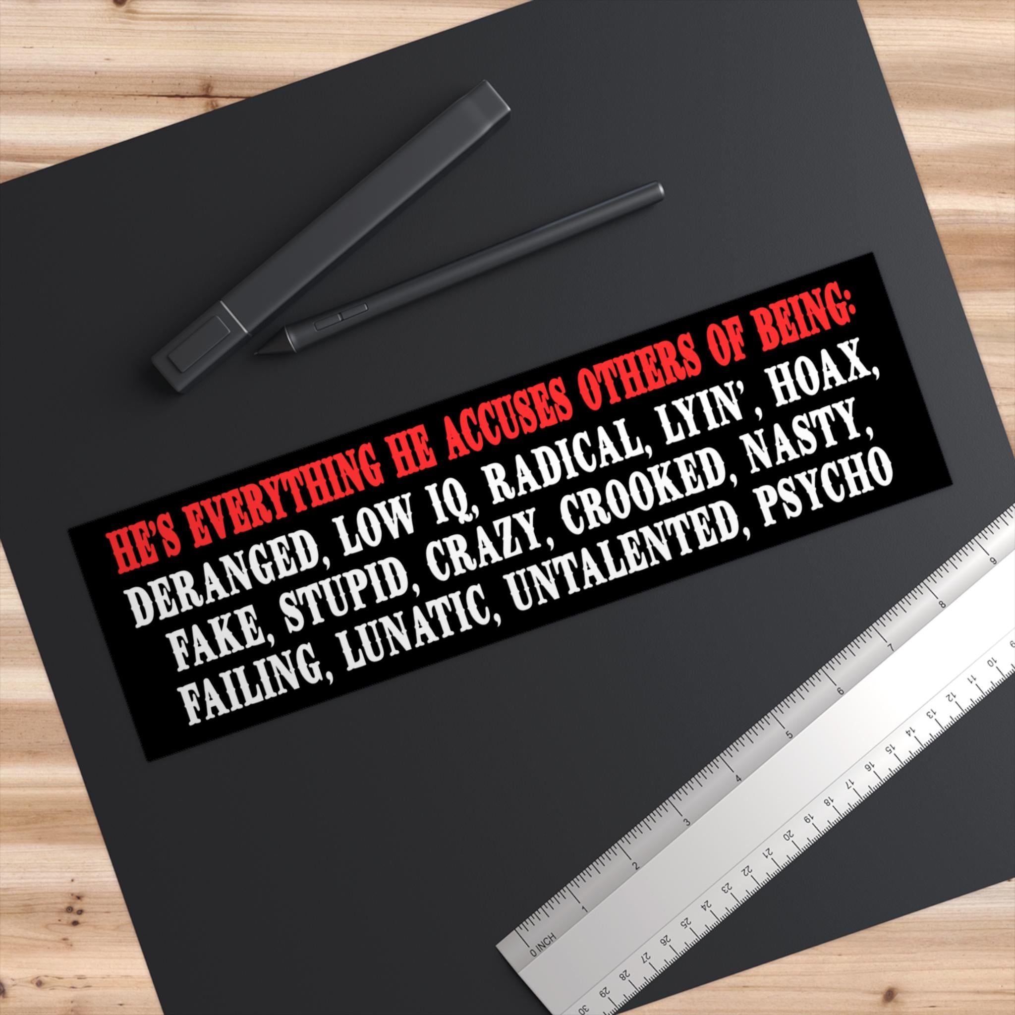 Bumper sticker with text listing negative accusations against someone.
