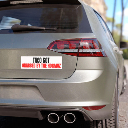 &amp;quot;TACO GOT GRABBED BY THE HORMUZ&amp;quot; text on a white bumper sticker on a car&amp;
