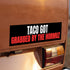 TACO GOT GRABBED BY THE HORMUZ sticker on car bumper.