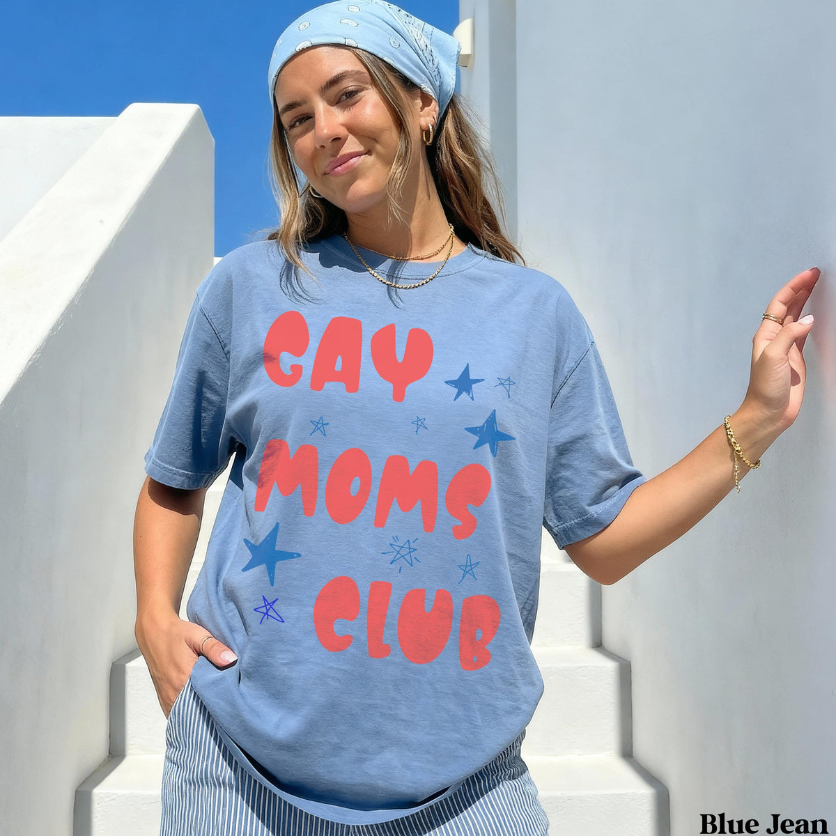 Blue t-shirt with &amp;quot;Gay Moms Club&amp;quot; text and stars design.
