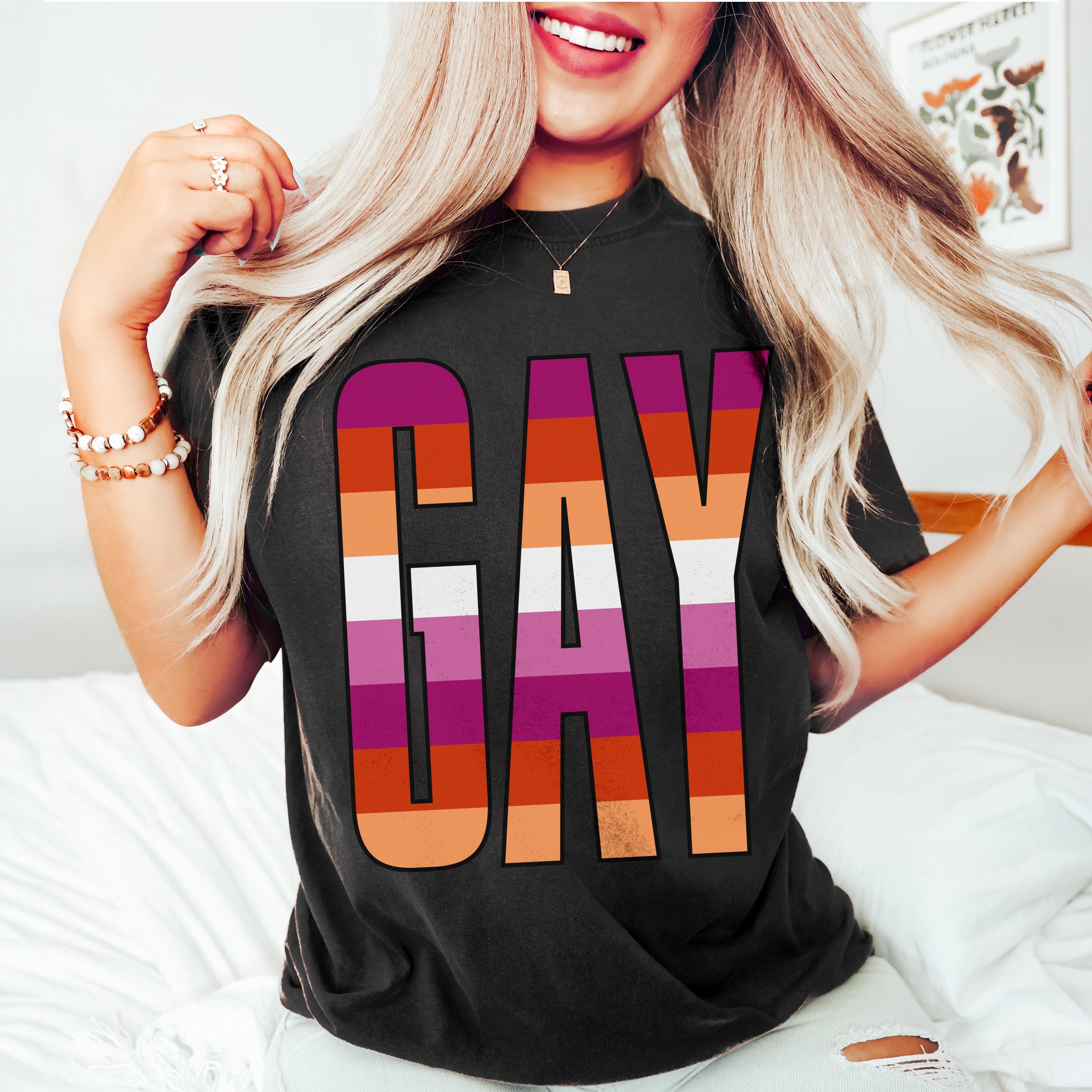 Black t-shirt with &amp;quot;GAY&amp;quot; in rainbow stripes of lesbian flag colors.