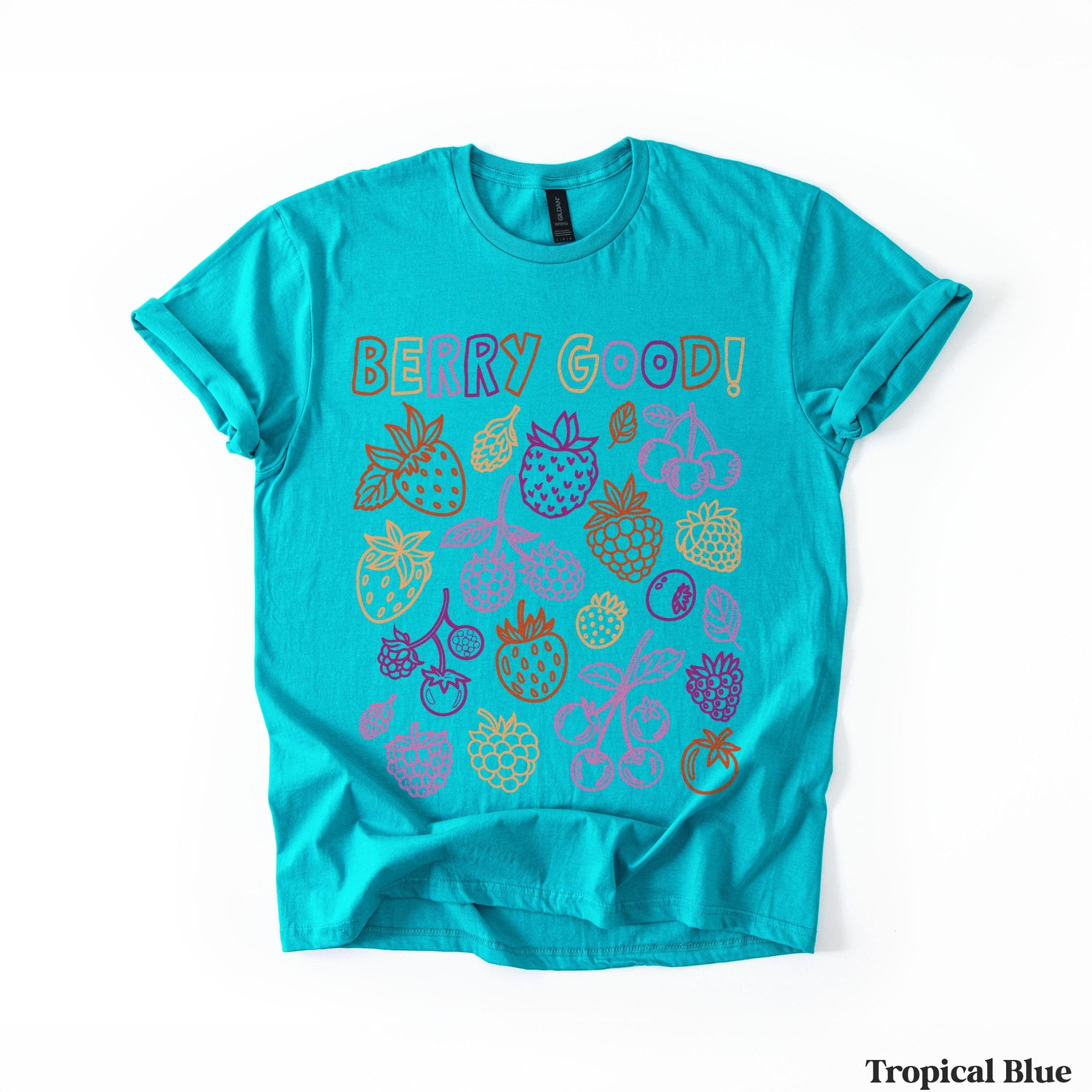 Teal t-shirt with &amp;quot;Berry Good!&amp;quot; text and colorful fruit illustrations.
