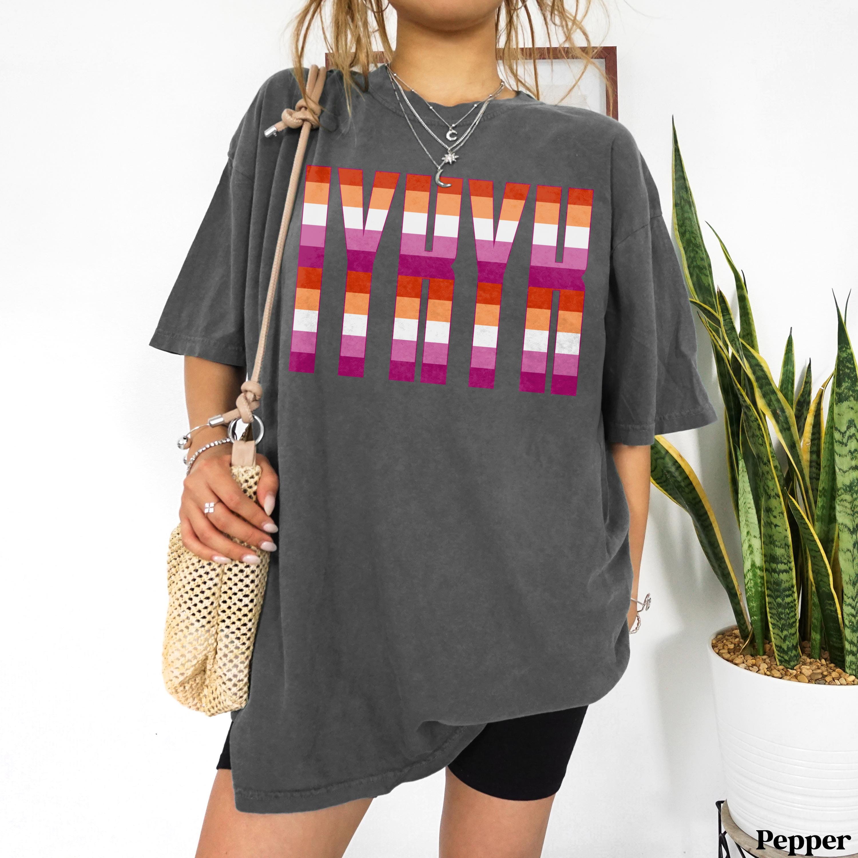 T-shirt with lesbian pride flag stripes forming the word &amp;quot;LOVE&amp;quot;.