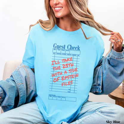 Light blue t-shirt with &amp;quot;Guest Check&amp;quot; graphic about Epstein files.