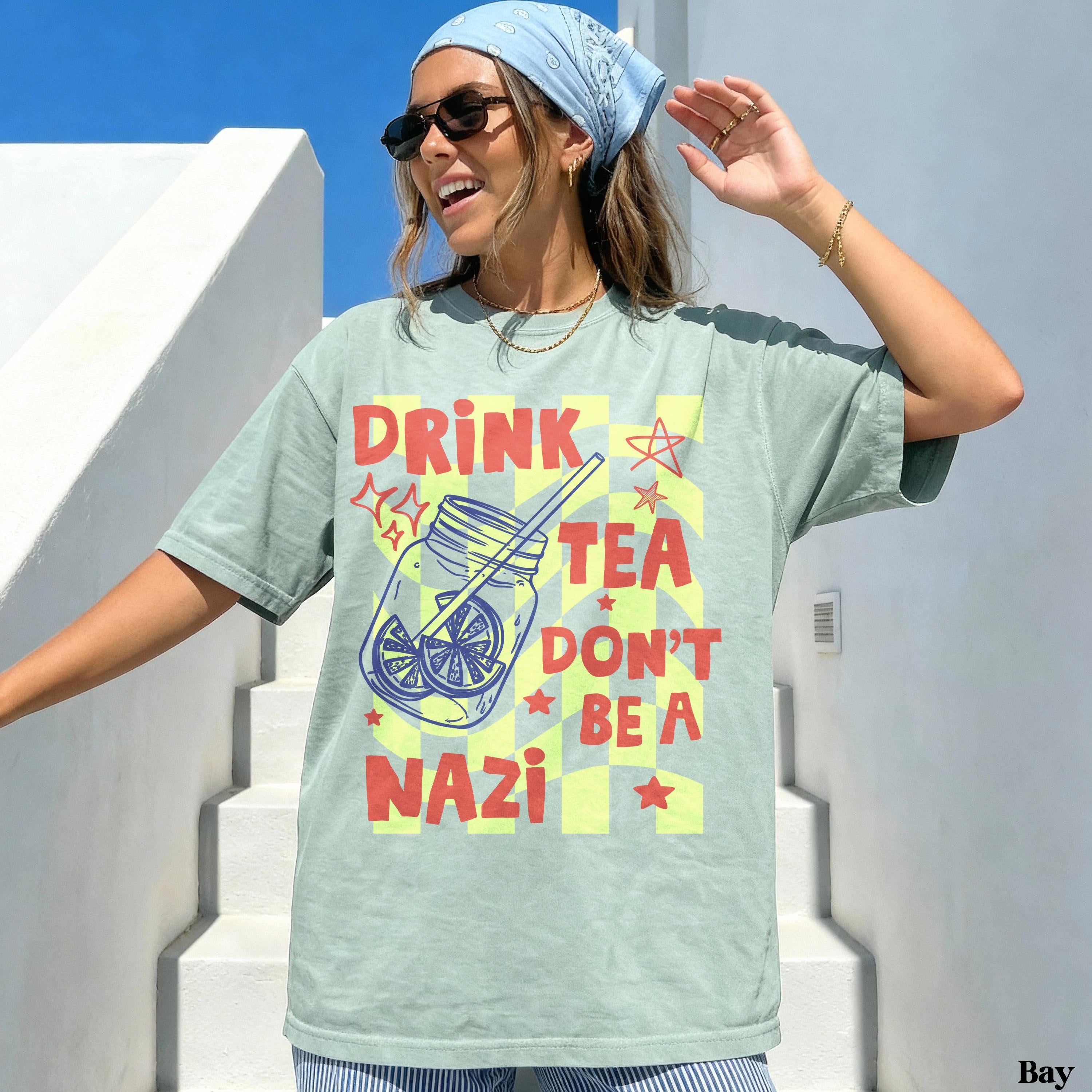 Green t-shirt with &amp;quot;DRINK TEA DON&amp;