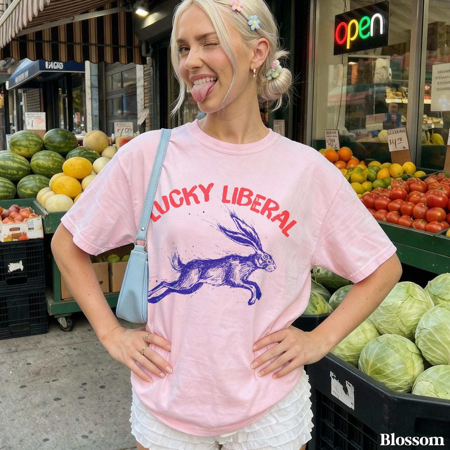 Pink t-shirt with blue rabbit graphic and &amp;quot;LUCKY LIBERAL&amp;quot; text.