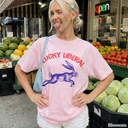 Pink t-shirt with blue rabbit graphic and &amp;quot;LUCKY LIBERAL&amp;quot; text.