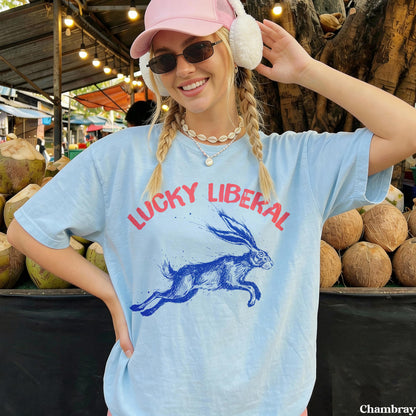 Light blue t-shirt with &amp;quot;Lucky Liberal&amp;quot; and a running rabbit graphic.
