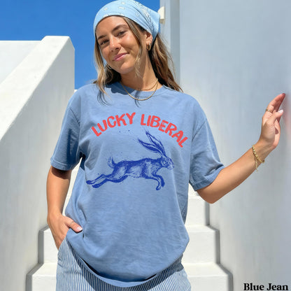 Blue t-shirt with &amp;quot;LUCKY LIBERAL&amp;quot; and running rabbit graphic.