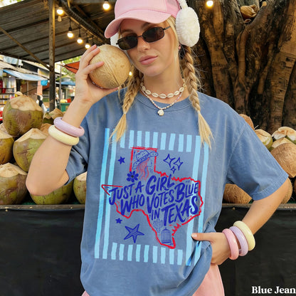 Blue t-shirt with &amp;quot;Just a girl who votes blue in Texas&amp;quot; text and Texas graphic.