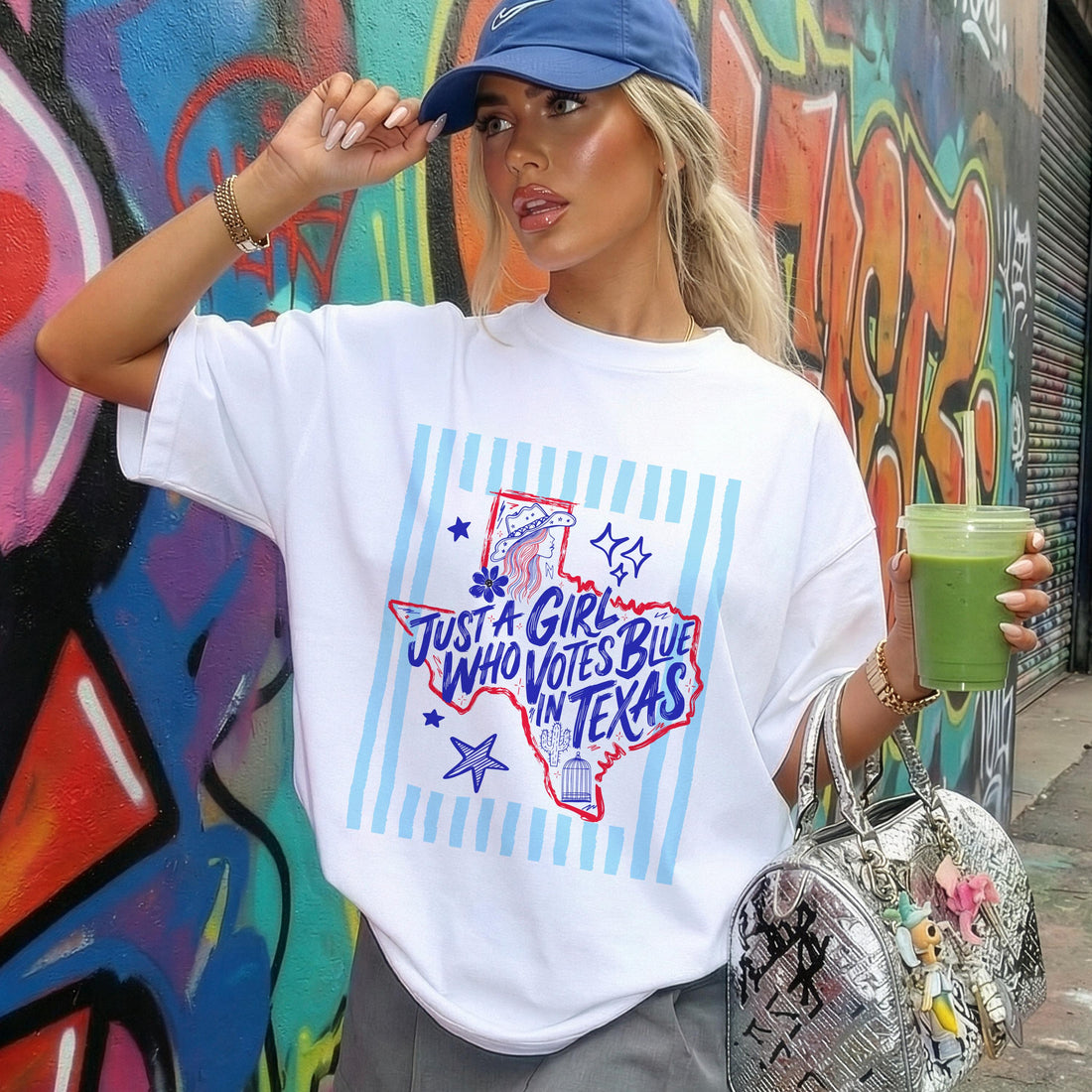 Woman in blue cap wearing white t-shirt with Texas flag and &amp;quot;Who Votes Blue in Texas&amp;quot; text.