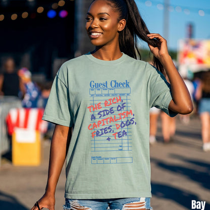 Light teal t-shirt with &amp;quot;The Rich, A Side of Capitalism, Fries, Dogs, + Tea&amp;quot; text.