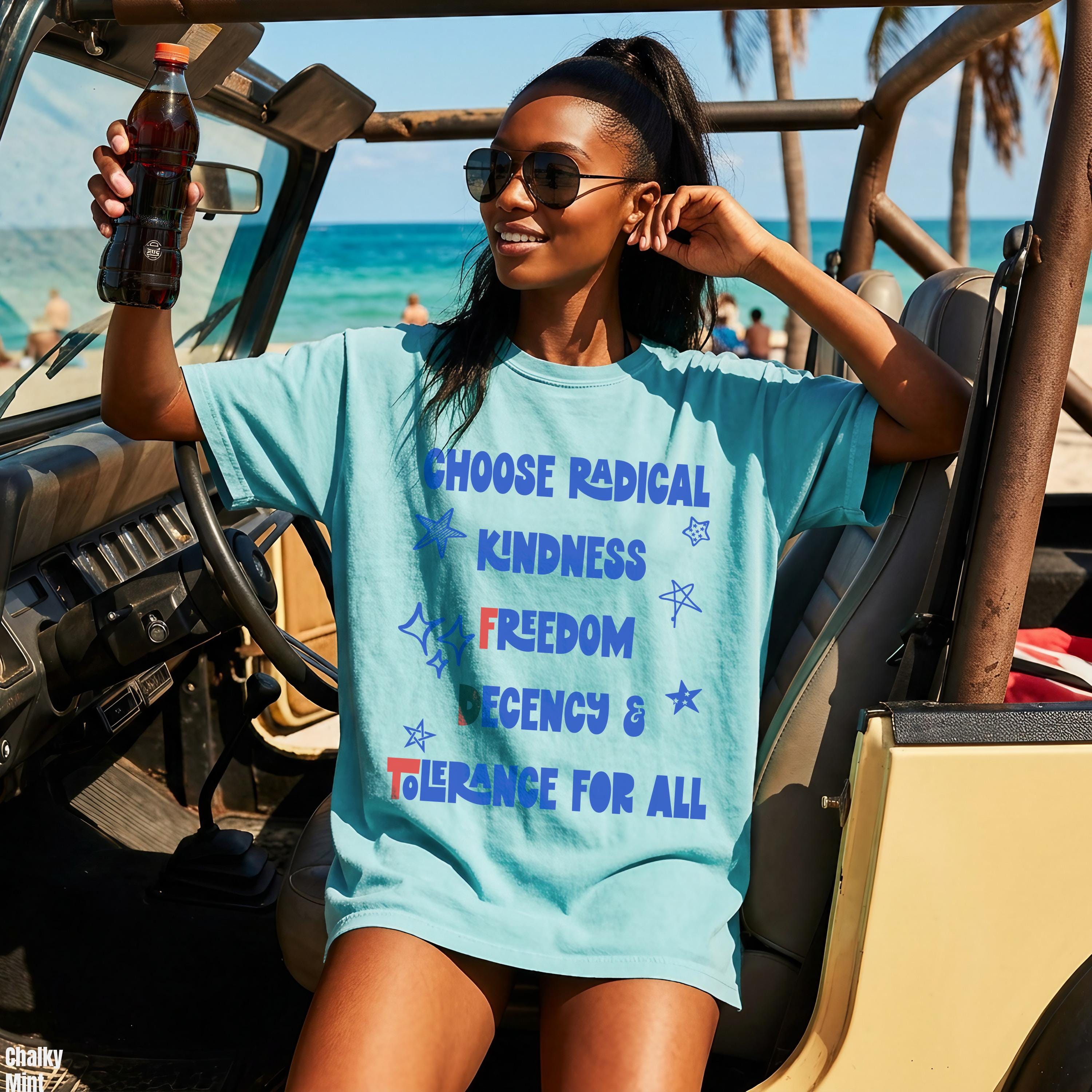 Teal t-shirt with &amp;quot;Choose Radical Kindness Freedom Tolerance For All&amp;quot; text, worn by a woman in a jeep.