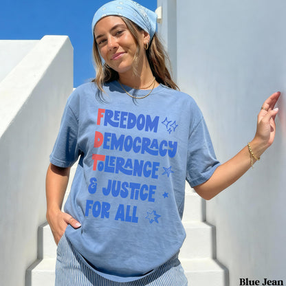 Blue t-shirt with red, white, and blue text: FREEDOM DEMOCRACY TOLERANCE &amp; JUSTICE FOR ALL.