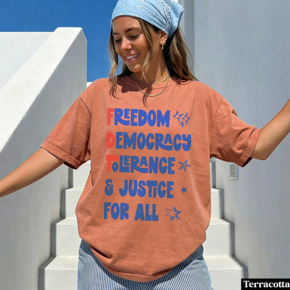 Terracotta t-shirt with &amp;quot;FREEDOM DEMOCRACY TOLERANCE &amp; JUSTICE FOR ALL&amp;quot; text.