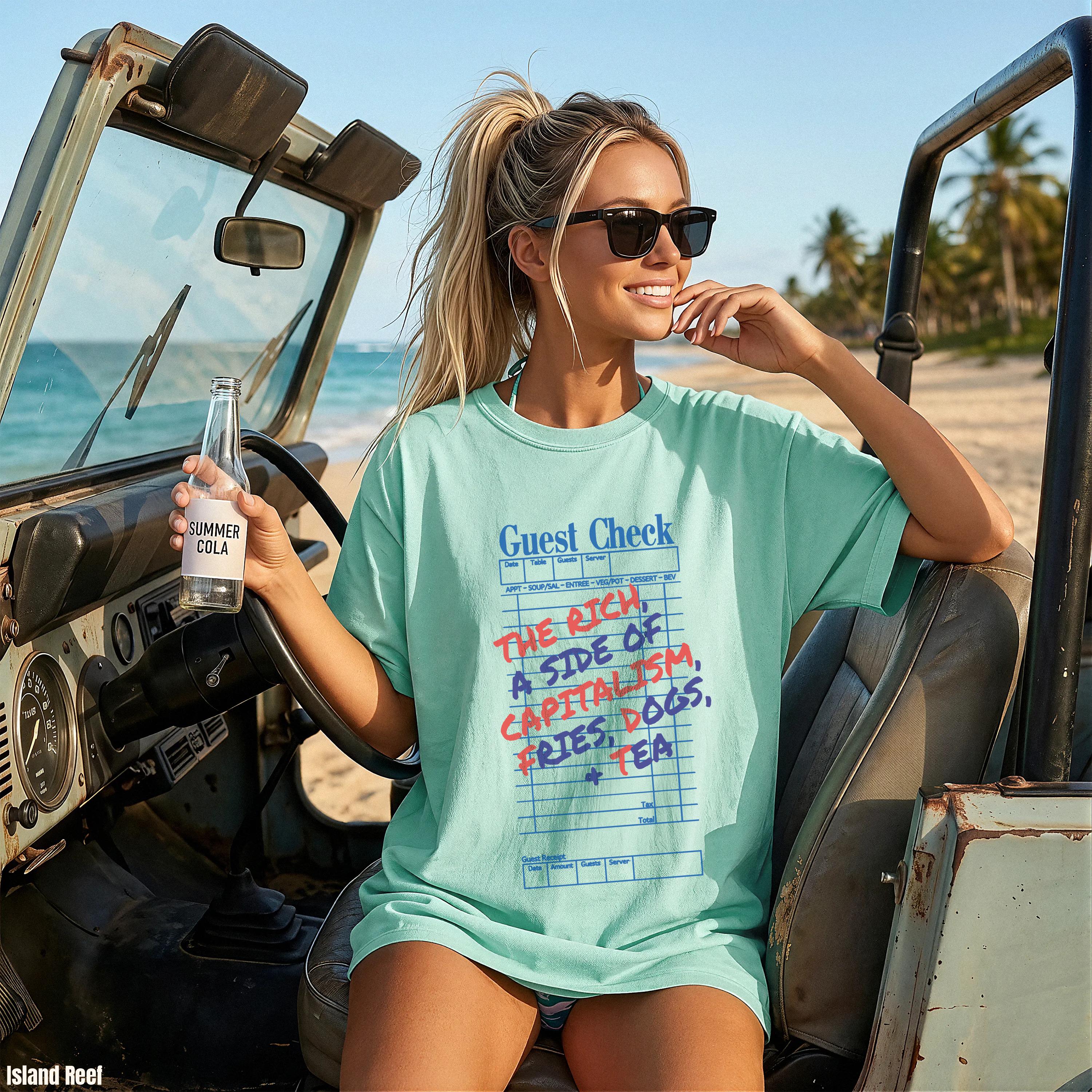 Woman in aqua t-shirt with &amp;quot;Guest Check&amp;quot; graphic, holding a bottle of &amp;quot;Summer Cola&amp;quot;.