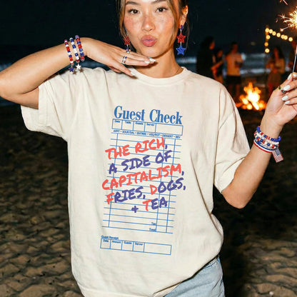 T-shirt with &amp;quot;Guest Check&amp;quot; design listing capitalism, fries, dogs, and tea.