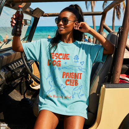 Light blue t-shirt with &amp;quot;Rescue Dog Parent Club&amp;quot; and dog graphics.
