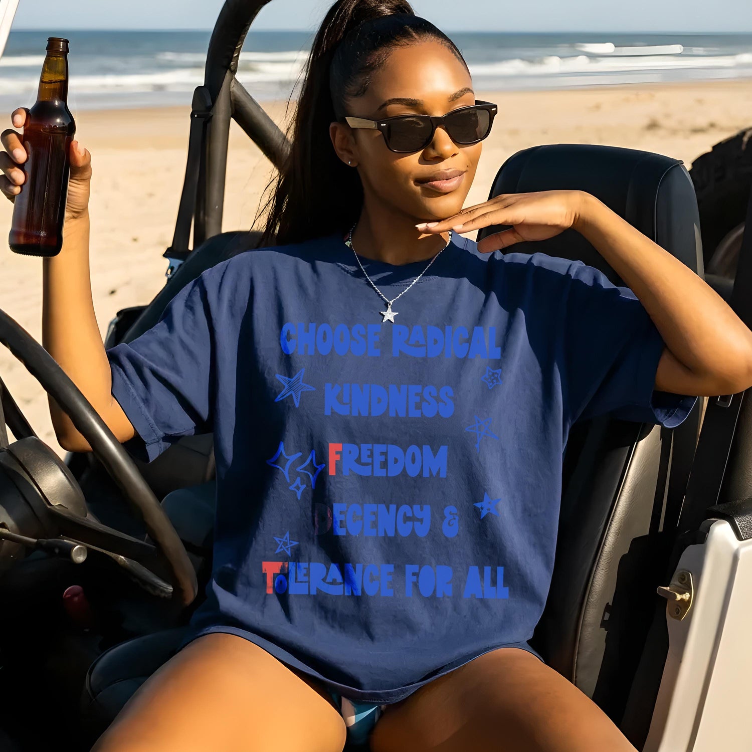 Woman in navy t-shirt with &amp;quot;CHOOSE RADICAL KINDNESS FREEDOM LEGENCY &amp; TOLERANCE FOR ALL&amp;quot; text.
