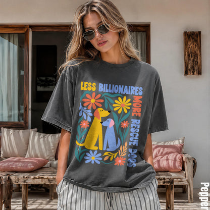 Woman wearing a dark grey t-shirt with &amp;quot;LESS BILLIONAIRES MORE RESCUE DOGS&amp;quot; and floral dog graphics.