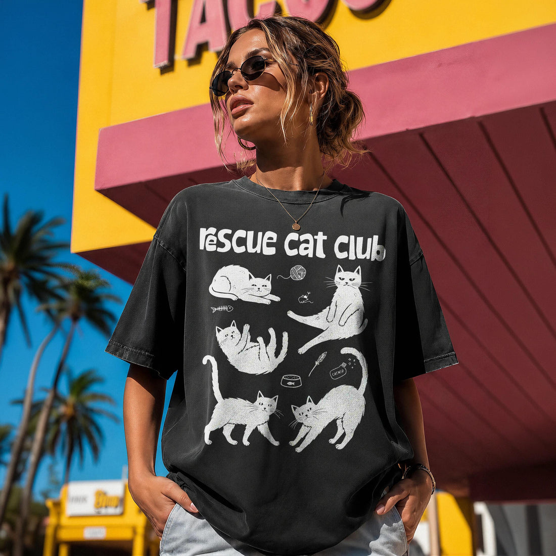 Black t-shirt with &amp;quot;Rescue Cat Club&amp;quot; and five illustrated cats.
