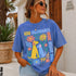 Blue t-shirt with "Less Billionaires More Rescue Dogs" text and floral dog graphic.