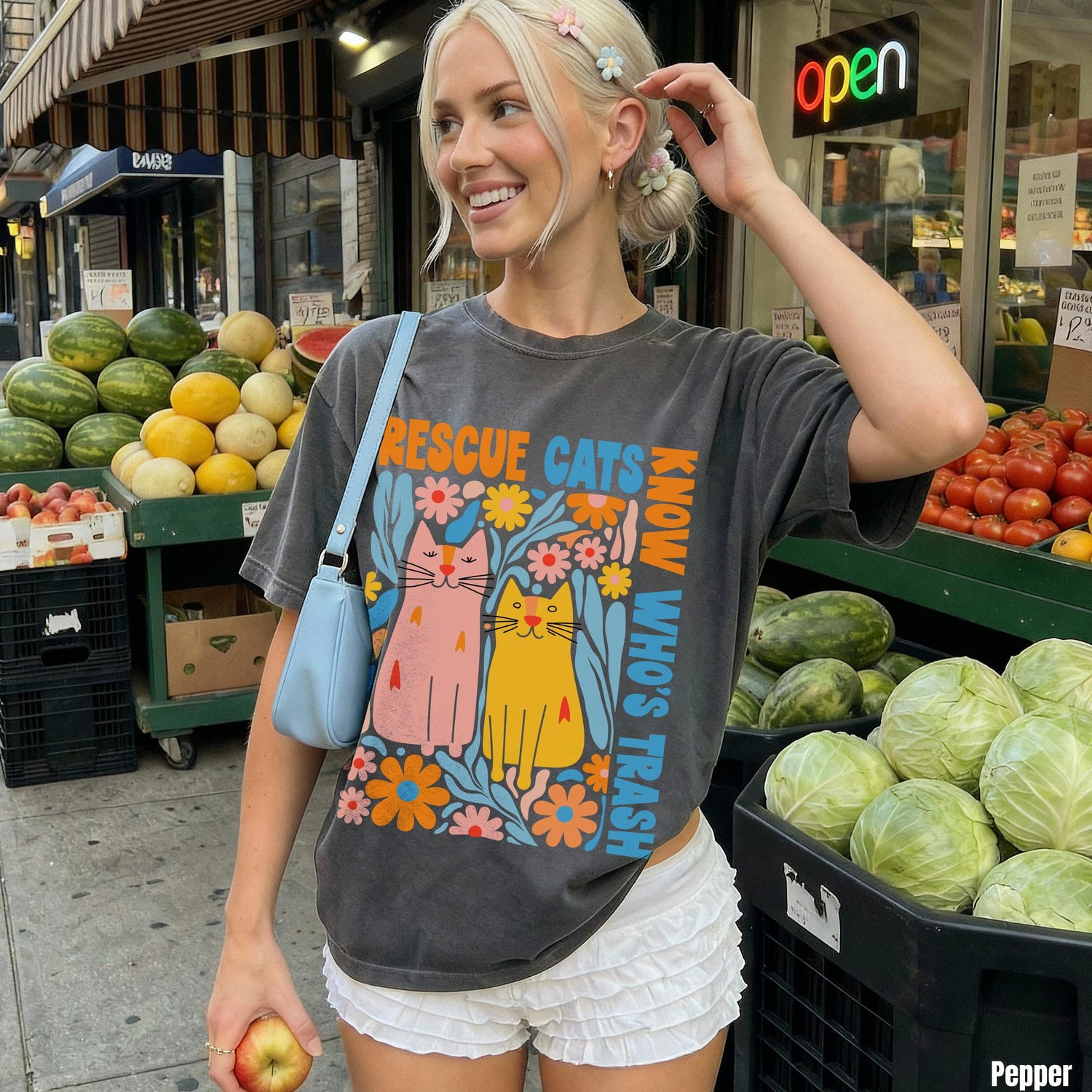 Dark grey t-shirt with colorful cat graphic and &amp;quot;RESCUE CATS KNOW WHO&amp;