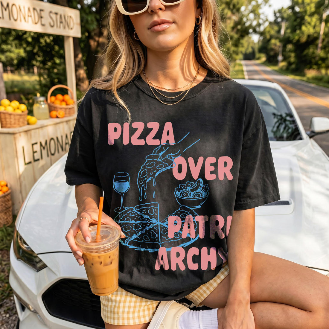 Black t-shirt with pink text reading &amp;quot;Pizza Over Patriarchy&amp;quot; and graphic.