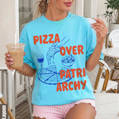 Blue t-shirt with orange text &amp;quot;Pizza Over Patriarchy&amp;quot; and graphic of pizza.