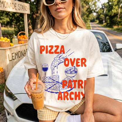 T-shirt with &amp;quot;Pizza Over Patriarchy&amp;quot; graphic and pizza illustrations.