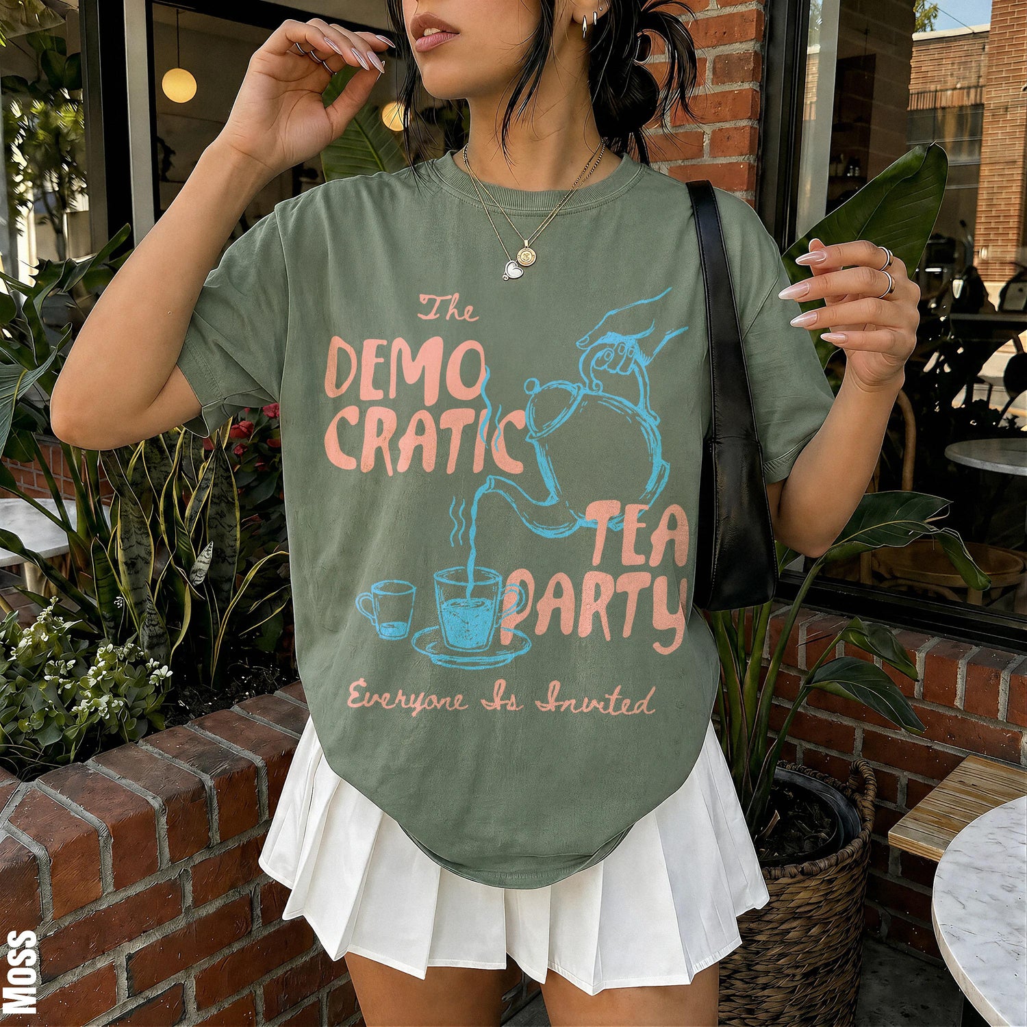 Green t-shirt with pink &amp;quot;The Democratic Tea Party&amp;quot; text and blue tea kettle graphic.