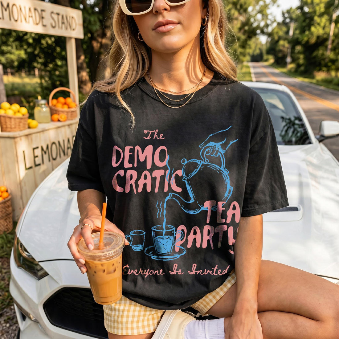 Black t-shirt with &amp;quot;The Democratic Tea Party Everyone Is Invited&amp;quot; text and graphics.