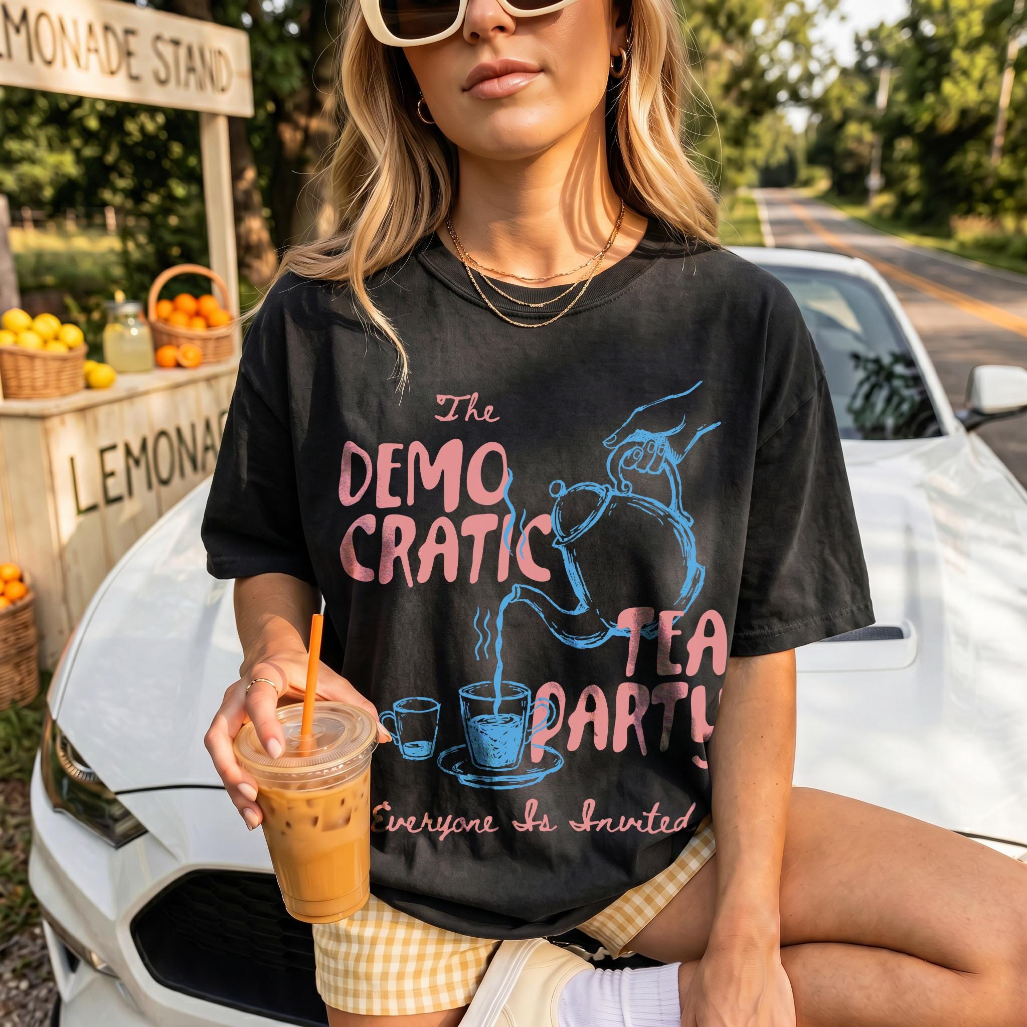 Black t-shirt with &amp;quot;The Democratic Tea Party Everyone Is Invited&amp;quot; text and graphics.